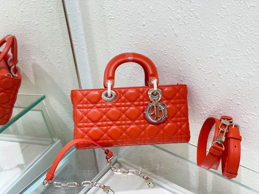 DIOR Lady D-Joy Bag. Authentic quality luxury bag crafted in genuine leather comes with authenticity card, dust bag and gift bag. Embrace timeless elegance - where beauty meets versatility. Exquisitely crafted from Cannage calfskin, this bag perfectly captures the House's unwavering commitment to elegance and beauty. Embodying the iconic streamlined aesthetic of the Lady Dior line, its refined and timeless style is further accentuated by the addition of meticulously designed metal 'D.I.O.R.' charms, gracing its silhouette with elegance. With its versatility in mind, this remarkable bag offers both a removable chain shoulder strap and an adjustable and removable leather shoulder strap, allowing it to be carried by hand or worn crossbody, making it the perfect daily companion.