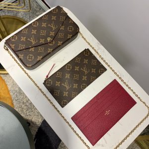 LOUIS VUITTON Pochette Félicie. Authentic quality luxury bag crafted in genuine leather comes with authenticity card, dust bag and gift bag. Elevate your essentials with the Pochette Félicie: Where style meets practicality. The Pochette Félicie in Monogram canvas presents itself as a chic and practical answer to effortlessly carry and arrange your everyday necessities. This adaptable pouch showcases two detachable pockets, including one designed with numerous card slots for your convenience. With the option to elegantly carry it as a clutch or drape it on your shoulder, courtesy of its removable gold-tone chain, versatility becomes its defining feature. - KRIS + KIKO LOUIS VUITTON Pochette Félicie. Original quality bag including gift box, literature, dust bag, authenticity card. The Pochette Félicie in Monogram canvas is a stylish solution to carry and organize daily essentials. This versatile pouch features two removable pockets, including one with several card slots. It can be carried as a clutch or a shoulder bag thanks to a removable gold-tone chain.
