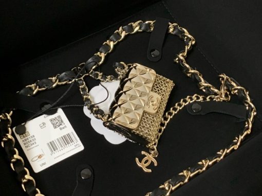 CHANEL Long Necklace. Authentic quality luxury bag crafted in genuine leather comes with authenticity card, dust bag and gift bag. Adorn yourself with timeless elegance. Introducing the exquisite CHANEL Long Necklace in a captivating combination of Gold, Black, and Pearly White, which proudly belongs to the esteemed Spring-Summer 2021 fashion collection. Meticulously designed and masterfully crafted, this stunning piece showcases the exceptional artistry and dedication synonymous with the iconic House of CHANEL.