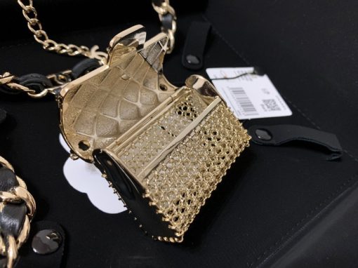 CHANEL Long Necklace. Authentic quality luxury bag crafted in genuine leather comes with authenticity card, dust bag and gift bag. Adorn yourself with timeless elegance. Introducing the exquisite CHANEL Long Necklace in a captivating combination of Gold, Black, and Pearly White, which proudly belongs to the esteemed Spring-Summer 2021 fashion collection. Meticulously designed and masterfully crafted, this stunning piece showcases the exceptional artistry and dedication synonymous with the iconic House of CHANEL.