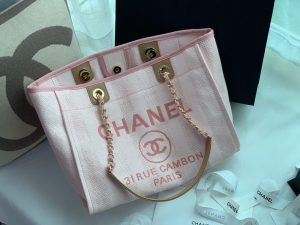 CHANEL Large Deauville Shopping Bag 2021. Authentic quality luxury bag crafted in genuine leather comes with authenticity card, dust bag and gift bag. Classic Elegance Meets Enduring Style. The CHANEL Deauville tote has evolved into an iconic CHANEL bag, gaining recognition as a popular choice. It frequently makes appearances in seasonal collections, showcasing surprising hues and materials. Interestingly, on the CHANEL website, it is referred to as the Shopping Bag; however, if you visit a CHANEL boutique and inquire about the Deauville, you will be guided to this exquisite tote bag.