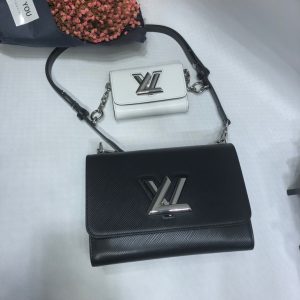 LOUIS VUITTON Twist MM And Twisty Bag. Authentic quality luxury bag crafted in genuine leather comes with authenticity card, dust bag and gift bag. Twist your style with the fashionable Twist Bag: a charm that doubles as storage. Charm Bags are currently all the rage in the world of fashion, and the Twist Bag has risen to become LOUIS VUITTON's most sought-after item. Its popularity can now be compared to that of their iconic Speedy bag. In keeping with the season's trends, the brand has introduced a delightful addition to the Twist Bag family: the mini charm twist bag. This exquisite accessory is skillfully attached right at the center, providing extra storage space. What sets this mini bag apart is its versatility; the charming attachment can be detached and easily incorporated into another bag. Aptly named Twisty, this mini Twist Bag is designed to be your perfect companion for carrying cards, coins, and more. - KRIS + KIKO LOUIS VUITTON Twist MM And Twisty Bag. Authentic quality luxury bag crafted in genuine leather comes with authenticity card, dust bag and gift bag. Twist your style with the fashionable Twist Bag: a charm that doubles as storage. Charm Bags are currently all the rage in the world of fashion, and the Twist Bag has risen to become LOUIS VUITTON's most sought-after item. Its popularity can now be compared to that of their iconic Speedy bag. In keeping with the season's trends, the brand has introduced a delightful addition to the Twist Bag family: the mini charm twist bag. This exquisite accessory is skillfully attached right at the center, providing extra storage space. What sets this mini bag apart is its versatility; the charming attachment can be detached and easily incorporated into another bag. Aptly named Twisty, this mini Twist Bag is designed to be your perfect companion for carrying cards, coins, and more.
