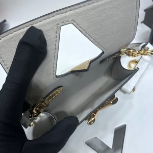LOUIS VUITTON Twist MM And Twisty Bag. Authentic quality luxury bag crafted in genuine leather comes with authenticity card, dust bag and gift bag. Twist your style with the fashionable Twist Bag: a charm that doubles as storage. Charm Bags are currently all the rage in the world of fashion, and the Twist Bag has risen to become LOUIS VUITTON's most sought-after item. Its popularity can now be compared to that of their iconic Speedy bag. In keeping with the season's trends, the brand has introduced a delightful addition to the Twist Bag family: the mini charm twist bag. This exquisite accessory is skillfully attached right at the center, providing extra storage space. What sets this mini bag apart is its versatility; the charming attachment can be detached and easily incorporated into another bag. Aptly named Twisty, this mini Twist Bag is designed to be your perfect companion for carrying cards, coins, and more. - KRIS + KIKO LOUIS VUITTON Twist MM And Twisty Bag. Authentic Quality Bag including gift box, literature, dust bag, authenticity card. Charm Bags are so fashionable right now. The Twist Bag has become LOUIS VUITTON’s top seller. It is now as famous as the Speedy bag. For this season, the house created a mini charm twist bag and attached it right in the center as extra storage. This charm can be detached and used in another bag. The mini Twist Bag is called Twisty and it is for carrying cards, coins, and more.