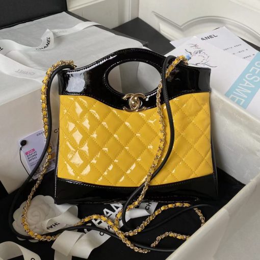 CHANEL 31 Shoulder Bag. Authentic quality luxury bag crafted in genuine leather comes with authenticity card, dust bag and gift bag. Elevate your style with versatility and elegance. Chanel's latest accessory launch for Fall, the Chanel 31, is both stylish and versatile. The name pays homage to Chanel's iconic address at 31 rue Cambon, while also cleverly playing on the French phrase "se mettre sur son 31" meaning to get dressed up. This bag stole the show at the recent F/W '18 show in Paris, as models clutched it, slung it across their bodies, and gripped it under their arms. The variety of ways to carry the bag demonstrates its extraordinary versatility.
