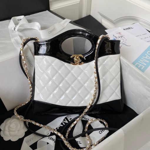 CHANEL 31 Shoulder Bag. Authentic quality luxury bag crafted in genuine leather comes with authenticity card, dust bag and gift bag. Elevate your style with versatility and elegance. Chanel's latest accessory launch for Fall, the Chanel 31, is both stylish and versatile. The name pays homage to Chanel's iconic address at 31 rue Cambon, while also cleverly playing on the French phrase "se mettre sur son 31" meaning to get dressed up. This bag stole the show at the recent F/W '18 show in Paris, as models clutched it, slung it across their bodies, and gripped it under their arms. The variety of ways to carry the bag demonstrates its extraordinary versatility.