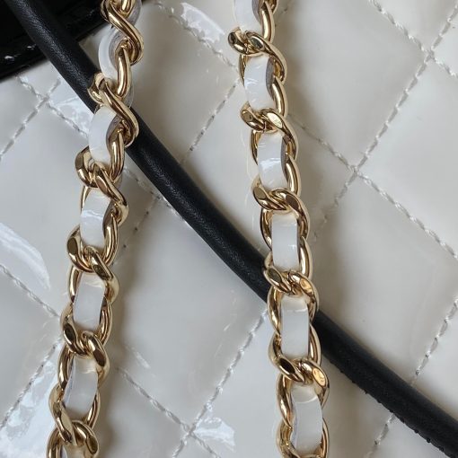 CHANEL 31 Shoulder Bag. Authentic quality luxury bag crafted in genuine leather comes with authenticity card, dust bag and gift bag. Elevate your style with versatility and elegance. Chanel's latest accessory launch for Fall, the Chanel 31, is both stylish and versatile. The name pays homage to Chanel's iconic address at 31 rue Cambon, while also cleverly playing on the French phrase "se mettre sur son 31" meaning to get dressed up. This bag stole the show at the recent F/W '18 show in Paris, as models clutched it, slung it across their bodies, and gripped it under their arms. The variety of ways to carry the bag demonstrates its extraordinary versatility.