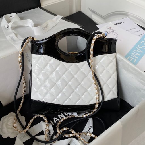 CHANEL 31 Shoulder Bag. Authentic quality luxury bag crafted in genuine leather comes with authenticity card, dust bag and gift bag. Elevate your style with versatility and elegance. Chanel's latest accessory launch for Fall, the Chanel 31, is both stylish and versatile. The name pays homage to Chanel's iconic address at 31 rue Cambon, while also cleverly playing on the French phrase "se mettre sur son 31" meaning to get dressed up. This bag stole the show at the recent F/W '18 show in Paris, as models clutched it, slung it across their bodies, and gripped it under their arms. The variety of ways to carry the bag demonstrates its extraordinary versatility.