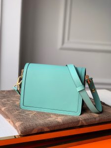 LOUIS VUITTON Mini Dauphine Crossbody and Shoulder Bag. Authentic quality luxury bag crafted in genuine leather comes with authenticity card, dust bag and gift bag. Elevate your style with the Lugano Mini - a timeless masterpiece. The newest addition to its beloved Dauphine family - the Lugano Mini. Crafted from sleek calfskin leather, it showcases an exquisite gold LV circle lock adorned with intricate silver guilloche detailing. Boasting refined and elegant design, along with practical carrying options, this bag is an absolute essential for fervent fans of the Dauphine collection. - KRIS + KIKO Cris and Coco Authentic Quality Luxury Bags and Accessories