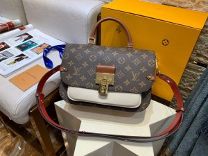 LOUIS VUITTON Vaugirard Messenger Bag. Authentic quality luxury bag crafted in genuine leather comes with authenticity card, dust bag and gift bag. Elevate your style with Vaugirard: Where Parisian allure meets impeccable design. Taking inspiration from a charming street in Paris, LOUIS VUITTON has once again exceeded expectations. The name itself is captivating, but the bag truly embodies beauty. Packed with functionality, adaptability, and ingenious design, the Vaugirard proves to be the ultimate companion that can accompany you anywhere. Crafted in the iconic Monogram canvas, this messenger-style masterpiece showcases a tasteful blend of supple leather in contrasting textures, effortlessly achieving an elegant yet relaxed appearance. Boasting a top Toron handle and a removable smart strap, the Vaugirard effortlessly adapts to various fashionable carrying styles, making it a versatile choice amidst contemporary trends. - KRIS + KIKO LOUIS VUITTON Vaugirard Messenger Bag. Authentic quality luxury bag crafted in genuine leather comes with authenticity card, dust bag and gift bag. Elevate your style with Vaugirard: Where Parisian allure meets impeccable design. Taking inspiration from a charming street in Paris, LOUIS VUITTON has once again exceeded expectations. The name itself is captivating, but the bag truly embodies beauty. Packed with functionality, adaptability, and ingenious design, the Vaugirard proves to be the ultimate companion that can accompany you anywhere. Crafted in the iconic Monogram canvas, this messenger-style masterpiece showcases a tasteful blend of supple leather in contrasting textures, effortlessly achieving an elegant yet relaxed appearance. Boasting a top Toron handle and a removable smart strap, the Vaugirard effortlessly adapts to various fashionable carrying styles, making it a versatile choice amidst contemporary trends.