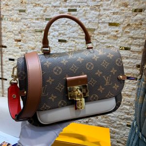 LOUIS VUITTON Vaugirard Messenger Bag. Authentic quality luxury bag crafted in genuine leather comes with authenticity card, dust bag and gift bag. Elevate your style with Vaugirard: Where Parisian allure meets impeccable design. Taking inspiration from a charming street in Paris, LOUIS VUITTON has once again exceeded expectations. The name itself is captivating, but the bag truly embodies beauty. Packed with functionality, adaptability, and ingenious design, the Vaugirard proves to be the ultimate companion that can accompany you anywhere. Crafted in the iconic Monogram canvas, this messenger-style masterpiece showcases a tasteful blend of supple leather in contrasting textures, effortlessly achieving an elegant yet relaxed appearance. Boasting a top Toron handle and a removable smart strap, the Vaugirard effortlessly adapts to various fashionable carrying styles, making it a versatile choice amidst contemporary trends. - KRIS + KIKO LOUIS VUITTON Vaugirard Messenger Bag. Authentic quality luxury bag crafted in genuine leather comes with authenticity card, dust bag and gift bag. Elevate your style with Vaugirard: Where Parisian allure meets impeccable design. Taking inspiration from a charming street in Paris, LOUIS VUITTON has once again exceeded expectations. The name itself is captivating, but the bag truly embodies beauty. Packed with functionality, adaptability, and ingenious design, the Vaugirard proves to be the ultimate companion that can accompany you anywhere. Crafted in the iconic Monogram canvas, this messenger-style masterpiece showcases a tasteful blend of supple leather in contrasting textures, effortlessly achieving an elegant yet relaxed appearance. Boasting a top Toron handle and a removable smart strap, the Vaugirard effortlessly adapts to various fashionable carrying styles, making it a versatile choice amidst contemporary trends.