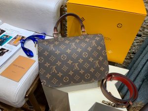 LOUIS VUITTON Vaugirard Messenger Bag. Authentic quality luxury bag crafted in genuine leather comes with authenticity card, dust bag and gift bag. Elevate your style with Vaugirard: Where Parisian allure meets impeccable design. Taking inspiration from a charming street in Paris, LOUIS VUITTON has once again exceeded expectations. The name itself is captivating, but the bag truly embodies beauty. Packed with functionality, adaptability, and ingenious design, the Vaugirard proves to be the ultimate companion that can accompany you anywhere. Crafted in the iconic Monogram canvas, this messenger-style masterpiece showcases a tasteful blend of supple leather in contrasting textures, effortlessly achieving an elegant yet relaxed appearance. Boasting a top Toron handle and a removable smart strap, the Vaugirard effortlessly adapts to various fashionable carrying styles, making it a versatile choice amidst contemporary trends. - KRIS + KIKO LOUIS VUITTON Vaugirard Messenger Bag. Original Quality Bag including gift box, literature, dust bag, authenticity card. Named after a unique street in Paris, Louis Vuitton has done it again. The name is pretty, but the bag is beautiful too. Compact, versatile and cleverly designed, the Vaugirard is an ideal go-everywhere bag. This messenger-style model in Monogram canvas features a combination of smooth and grained colored leather, for a look that is polished yet casual. With its top Toron handle and removable smart strap, the Vaugirard lends itself to a variety of on-trend carries.