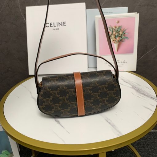 CELINE Clutch On Strap. Authentic quality luxury bag crafted in genuine leather comes with authenticity card, dust bag and gift bag. Impeccably Minimalistic, Captivatingly Chic. Celine has truly outdone themselves with this exquisite small bag, which showcases their exceptional design skills in a minimalistic edition. The standout feature of this bag is the remarkable leather strap that elegantly connects to the ornamental lock, boasting a beautifully large and shimmering gold hardware. This captivating lock will undoubtedly steal all the attention. To cater to various carrying preferences, the bag is equipped with a convenient short-handle for hand-carry, while also providing a long leather strap for shoulder carry. The slender and delicate appearance of the straps adds a touch of femininity to this delightful creation.