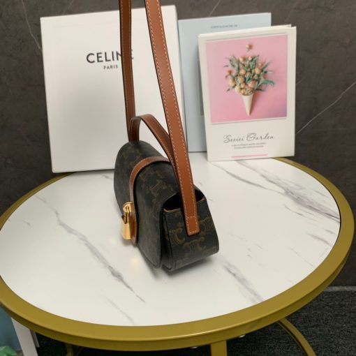 CELINE Clutch On Strap. Authentic quality luxury bag crafted in genuine leather comes with authenticity card, dust bag and gift bag. Impeccably Minimalistic, Captivatingly Chic. Celine has truly outdone themselves with this exquisite small bag, which showcases their exceptional design skills in a minimalistic edition. The standout feature of this bag is the remarkable leather strap that elegantly connects to the ornamental lock, boasting a beautifully large and shimmering gold hardware. This captivating lock will undoubtedly steal all the attention. To cater to various carrying preferences, the bag is equipped with a convenient short-handle for hand-carry, while also providing a long leather strap for shoulder carry. The slender and delicate appearance of the straps adds a touch of femininity to this delightful creation.