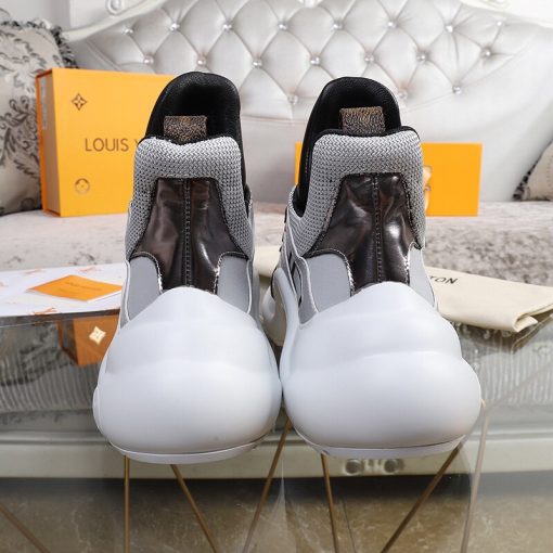 LOUIS VUITTON 'Archlight' Trainer. Authentic quality luxury sneaker crafted in genuine leather comes with authenticity card, dust bag and gift bag. Technology meets femininity. This futuristic sneaker harmoniously combines a bouncy wave-shaped outsole and a generously proportioned tongue, while maintaining an elegant low cut around the ankle to add a gentle, feminine flair.
