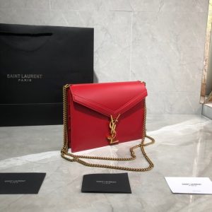 SAINT LAURENT Cassandra Monogram Chain Bag. Authentic quality luxury bag crafted in genuine leather comes with authenticity card, dust bag and gift bag. Embrace Timeless Elegance. The Cassandra shoulder bag exhibits unrivaled sophistication. Meticulously crafted from high-quality calf leather, it is adorned with exquisite metal-tone hardware, including purse feet that ensure its impeccable condition. The choice is yours—gracefully drape it over a shoulder or elegantly carry it in-hand.2 - KRIS + KIKO SAINT LAURENT Cassandra Monogram Chain Bag. Original Quality Bag including gift box, literature, dust bag, authenticity card. This Cassandra shoulder bag is a masterclass in refined elegance. Crafted in calf leather, it's punctuated with metal-tone hardware including purse feet to keep it in pristine condition. Whether you wear it over one shoulder or carried in-hand is up to you.