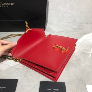 SAINT LAURENT Cassandra Monogram Chain Bag. Authentic quality luxury bag crafted in genuine leather comes with authenticity card, dust bag and gift bag. Embrace Timeless Elegance. The Cassandra shoulder bag exhibits unrivaled sophistication. Meticulously crafted from high-quality calf leather, it is adorned with exquisite metal-tone hardware, including purse feet that ensure its impeccable condition. The choice is yours—gracefully drape it over a shoulder or elegantly carry it in-hand. - KRIS + KIKO SAINT LAURENT Cassandra Monogram Chain Bag. Authentic quality luxury bag crafted in genuine leather comes with authenticity card, dust bag and gift bag. Embrace Timeless Elegance. The Cassandra shoulder bag exhibits unrivaled sophistication. Meticulously crafted from high-quality calf leather, it is adorned with exquisite metal-tone hardware, including purse feet that ensure its impeccable condition. The choice is yours—gracefully drape it over a shoulder or elegantly carry it in-hand.