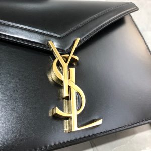 SAINT LAURENT Cassandra Monogram Chain Bag. Authentic quality luxury bag crafted in genuine leather comes with authenticity card, dust bag and gift bag. Embrace Timeless Elegance. The Cassandra shoulder bag exhibits unrivaled sophistication. Meticulously crafted from high-quality calf leather, it is adorned with exquisite metal-tone hardware, including purse feet that ensure its impeccable condition. The choice is yours—gracefully drape it over a shoulder or elegantly carry it in-hand. - KRIS + KIKO SAINT LAURENT Cassandra Monogram Chain Bag. Authentic quality luxury bag crafted in genuine leather comes with authenticity card, dust bag and gift bag. Embrace Timeless Elegance. The Cassandra shoulder bag exhibits unrivaled sophistication. Meticulously crafted from high-quality calf leather, it is adorned with exquisite metal-tone hardware, including purse feet that ensure its impeccable condition. The choice is yours—gracefully drape it over a shoulder or elegantly carry it in-hand.