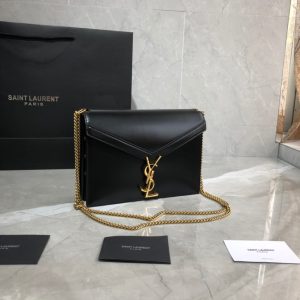 SAINT LAURENT Cassandra Monogram Chain Bag. Authentic quality luxury bag crafted in genuine leather comes with authenticity card, dust bag and gift bag. Embrace Timeless Elegance. The Cassandra shoulder bag exhibits unrivaled sophistication. Meticulously crafted from high-quality calf leather, it is adorned with exquisite metal-tone hardware, including purse feet that ensure its impeccable condition. The choice is yours—gracefully drape it over a shoulder or elegantly carry it in-hand. - KRIS + KIKO SAINT LAURENT Cassandra Monogram Chain Bag. Original Quality Bag including gift box, literature, dust bag, authenticity card. This Cassandra shoulder bag is a masterclass in refined elegance. Crafted in calf leather, it's punctuated with metal-tone hardware including purse feet to keep it in pristine condition. Whether you wear it over one shoulder or carried in-hand is up to you.