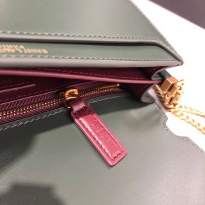 SAINT LAURENT Cassandra Monogram Chain Bag. Authentic quality luxury bag crafted in genuine leather comes with authenticity card, dust bag and gift bag. Embrace Timeless Elegance. The Cassandra shoulder bag exhibits unrivaled sophistication. Meticulously crafted from high-quality calf leather, it is adorned with exquisite metal-tone hardware, including purse feet that ensure its impeccable condition. The choice is yours—gracefully drape it over a shoulder or elegantly carry it in-hand. - KRIS + KIKO SAINT LAURENT Cassandra Monogram Chain Bag. Original Quality Bag including gift box, literature, dust bag, authenticity card. This Cassandra shoulder bag is a masterclass in refined elegance. Crafted in calf leather, it's punctuated with metal-tone hardware including purse feet to keep it in pristine condition. Whether you wear it over one shoulder or carried in-hand is up to you.