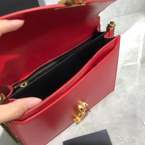 SAINT LAURENT Cassandra Monogram Chain Bag. Authentic quality luxury bag crafted in genuine leather comes with authenticity card, dust bag and gift bag. Embrace Timeless Elegance. The Cassandra shoulder bag exhibits unrivaled sophistication. Meticulously crafted from high-quality calf leather, it is adorned with exquisite metal-tone hardware, including purse feet that ensure its impeccable condition. The choice is yours—gracefully drape it over a shoulder or elegantly carry it in-hand. - KRIS + KIKO SAINT LAURENT Cassandra Monogram Chain Bag. Original Quality Bag including gift box, literature, dust bag, authenticity card. This Cassandra shoulder bag is a masterclass in refined elegance. Crafted in calf leather, it's punctuated with metal-tone hardware including purse feet to keep it in pristine condition. Whether you wear it over one shoulder or carried in-hand is up to you.