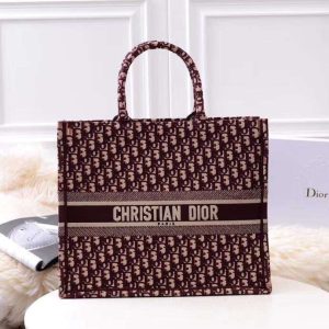 DIOR Book Tote DIOR Oblique Canvas Bag. Authentic quality luxury bag crafted in genuine leather comes with authenticity card, dust bag and gift bag. Inspired by Heritage, Designed for the Future. Inspired by a beautiful drawing created by Marc Bohan in 1967, Maria Grazia Chiuri delved into the esteemed Dior House archives to unveil the magnificent Dior Book Tote as part of the brand's exquisite Spring/Summer 2018 collection. - KRIS + KIKO DIOR Book Tote DIOR Oblique Canvas Bag. Authentic quality luxury bag crafted in genuine leather comes with authenticity card, dust bag and gift bag. Inspired by Heritage, Designed for the Future. Inspired by a beautiful drawing created by Marc Bohan in 1967, Maria Grazia Chiuri delved into the esteemed Dior House archives to unveil the magnificent Dior Book Tote as part of the brand's exquisite Spring/Summer 2018 collection.