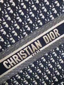 DIOR Book Tote DIOR Oblique Canvas Bag. Authentic quality luxury bag crafted in genuine leather comes with authenticity card, dust bag and gift bag. Inspired by Heritage, Designed for the Future. Inspired by a beautiful drawing created by Marc Bohan in 1967, Maria Grazia Chiuri delved into the esteemed Dior House archives to unveil the magnificent Dior Book Tote as part of the brand's exquisite Spring/Summer 2018 collection. - KRIS + KIKO DIOR Book Tote DIOR Oblique Canvas Bag. Authentic quality luxury bag crafted in genuine leather comes with authenticity card, dust bag and gift bag. Inspired by Heritage, Designed for the Future. Inspired by a beautiful drawing created by Marc Bohan in 1967, Maria Grazia Chiuri delved into the esteemed Dior House archives to unveil the magnificent Dior Book Tote as part of the brand's exquisite Spring/Summer 2018 collection.