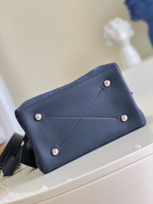 LOUIS VUITTON Muria. Authentic quality luxury bag crafted in genuine leather comes with authenticity card, dust bag and gift bag. A Fashionable Fusion of Colors and Craftsmanship! Introducing the Muria bucket bag, crafted from a refreshing Mahina perforated leather in a unique blend of blue, red, and caramel hues. Each tiny hole intricately hand-dyed, this striking tricolor rendition of the iconic Monogram pattern adds a vibrant flair to the supple calf leather. Completing the ensemble, the bag features a beautifully braided top handle.