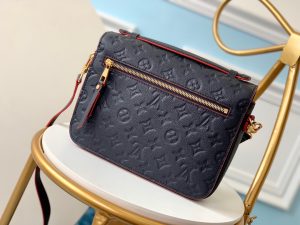 LOUIS VUITTON Pochette Métis Monogram Empreinte Leather. Authentic quality luxury bag crafted in genuine leather comes with authenticity card, dust bag and gift bag. Elegance meets functionality. The epitome of grace and sophistication is embodied in the dainty silhouette of the Pochette Métis. Crafted from supple Monogram empreinte leather, its petite proportions unveil a plethora of practical pockets and compartments.4 - KRIS + KIKO High quality designer bags and authentic luxury