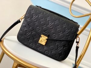 LOUIS VUITTON Pochette Métis Monogram Empreinte Leather. Authentic quality luxury bag crafted in genuine leather comes with authenticity card, dust bag and gift bag. Elegance meets functionality. The epitome of grace and sophistication is embodied in the dainty silhouette of the Pochette Métis. Crafted from supple Monogram empreinte leather, its petite proportions unveil a plethora of practical pockets and compartments. - KRIS + KIKO LOUIS VUITTON Pochette Métis Monogram Empreinte Leather. Original Quality Bag. Gold-metal toned Hardware. LOUIS VUITTON Sales Box and Dust Bag. Booklet, Authenticity Card, Payment Slip. Elegance is personified in the petite shape of the Pochette Métis. Made of supple Monogram empreinte leather, its compact dimensions open up to reveal many useful pockets and compartments.