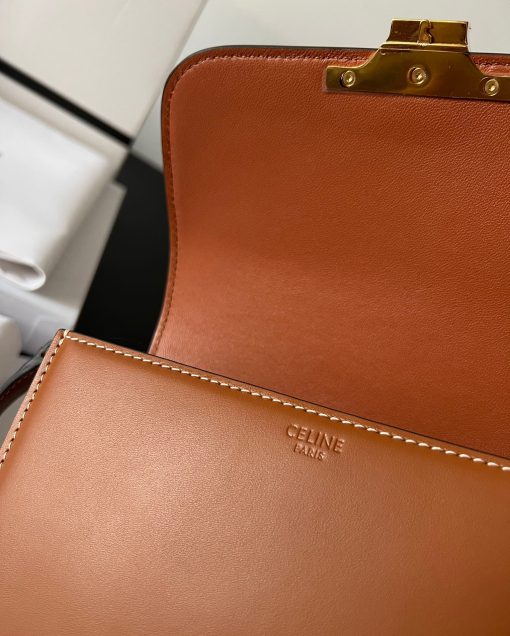 CELINE Teen Triomphe. Authentic quality luxury bag crafted in genuine leather comes with authenticity card, dust bag and gift bag. Where timeless elegance meets fashion-forward sophistication. The original Triomphe, launched by Hedi Slimane in 2018, garnered widespread praise. Since then, this chic handbag has become a favorite amongst celebrities and fashion insiders worldwide. Its sleek leather exterior and understated hardware effortlessly merge style and practicality, beautifully accentuated by Celine's iconic golden Triomphe logo fastener. This exquisite design has captivated the interest of bag collectors and fashion historians alike, thanks to its sophisticated yet uncomplicated aesthetic. The timeless appeal of this classic piece has even inspired a range of spinoffs, solidifying the Triomphe's status as a revered fashion icon.
