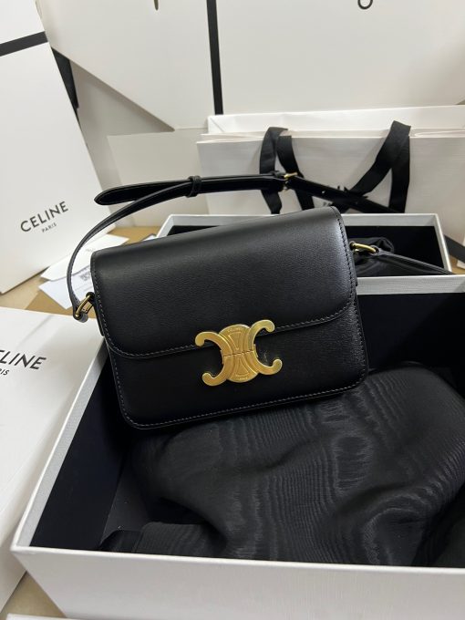 CELINE Teen Triomphe. Authentic quality luxury bag crafted in genuine leather comes with authenticity card, dust bag and gift bag. Where timeless elegance meets fashion-forward sophistication. The original Triomphe, launched by Hedi Slimane in 2018, garnered widespread praise. Since then, this chic handbag has become a favorite amongst celebrities and fashion insiders worldwide. Its sleek leather exterior and understated hardware effortlessly merge style and practicality, beautifully accentuated by Celine's iconic golden Triomphe logo fastener. This exquisite design has captivated the interest of bag collectors and fashion historians alike, thanks to its sophisticated yet uncomplicated aesthetic. The timeless appeal of this classic piece has even inspired a range of spinoffs, solidifying the Triomphe's status as a revered fashion icon.