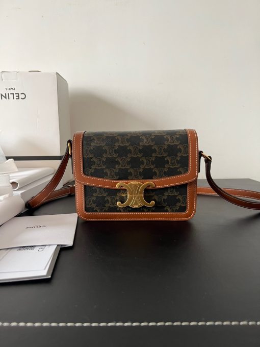CELINE Teen Triomphe. Authentic quality luxury bag crafted in genuine leather comes with authenticity card, dust bag and gift bag. Where timeless elegance meets fashion-forward sophistication. The original Triomphe, launched by Hedi Slimane in 2018, garnered widespread praise. Since then, this chic handbag has become a favorite amongst celebrities and fashion insiders worldwide. Its sleek leather exterior and understated hardware effortlessly merge style and practicality, beautifully accentuated by Celine's iconic golden Triomphe logo fastener. This exquisite design has captivated the interest of bag collectors and fashion historians alike, thanks to its sophisticated yet uncomplicated aesthetic. The timeless appeal of this classic piece has even inspired a range of spinoffs, solidifying the Triomphe's status as a revered fashion icon.