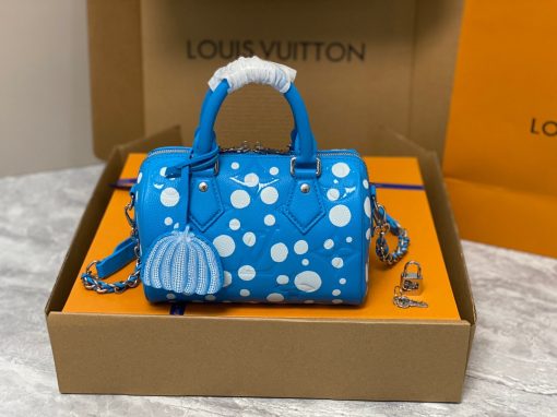 LOUIS VUITTON Speedy Bandoulière 20. Authentic quality luxury bag crafted in genuine leather comes with authenticity card, dust bag and gift bag. Experience elegance and sophistication with this timeless designer handbag. This is an iconic and stylish designer handbag, perfect for any fashionable woman. The Speedy Bandoulière 20 has all the features that make LV such a sought-after luxury brand. This bag has a resilient material, deep pockets, a spacious interior, and an adjustable shoulder strap. The exterior is crafted from durable and elegant Monogram canvas, giving it a timeless style that will last for years. It also features a discreet Lozine trim, making it both striking and sophisticated. Inside, it is lined with matching textiles with a pocket for small items, ensuring all your essentials are secure and organized. The adjustable strap allows you to wear the bag on the shoulder or carry it as a top handle bag, making it perfect for either day or night. And with a zip closure, you can always rest assured that all your items are safely contained. The Speedy Bandoulière 20 is sure to add a touch of luxury to any look.