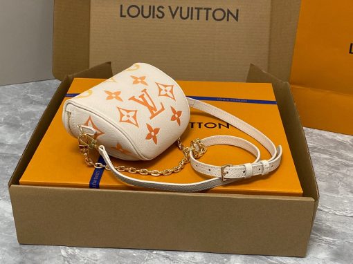 LOUIS VUITTON Mini Bumbag. Authentic quality luxury bag crafted in genuine leather comes with authenticity card, dust bag and gift bag. Embrace elegance and style, perfect for every occasion. Introducing the Mini Bumbag from LV's exquisite Gradient Collection, a beautifully designed bag that perfectly captures the current fashion trend. Detailed with Monogram Empreinte leather displaying an enchanting color gradient, this bag effortlessly elevates your accessory collection. The main compartment is secured by a zip closure, accompanied by a front pocket embellished with an elegant Louis Vuitton leather tag. For ultimate versatility, adjustable and removable straps allow for both cross-body and shoulder wear. To complete its charm, this Mini Bumbag is complemented by a chic gold-tone chain, making it a must-have accessory for any summer occasion.