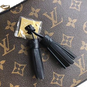 LOUIS VUITTON Saintonge Monogram Canvas Crossbody Bag. Authentic quality luxury bag crafted in genuine leather comes with authenticity card, dust bag and gift bag. Unleash Your Youthful Style. The Saintonge, a stylishly compact bag, harmoniously blends the iconic Monogram canvas with smooth calfskin, radiating a youthful energy. Enhanced by the luxurious leather, the design exudes a striking contrast and amplified volume, while the delightful tassels add a playful element. Offering versatility, the bag can be worn elegantly by its top handle or effortlessly transformed into a crossbody or shoulder bag with the included long strap. - KRIS + KIKO LOUIS VUITTON Saintonge Monogram Canvas Crossbody Bag. Authentic quality luxury bag crafted in genuine leather comes with authenticity card, dust bag and gift bag. Unleash Your Youthful Style. The Saintonge, a stylishly compact bag, harmoniously blends the iconic Monogram canvas with smooth calfskin, radiating a youthful energy. Enhanced by the luxurious leather, the design exudes a striking contrast and amplified volume, while the delightful tassels add a playful element. Offering versatility, the bag can be worn elegantly by its top handle or effortlessly transformed into a crossbody or shoulder bag with the included long strap.