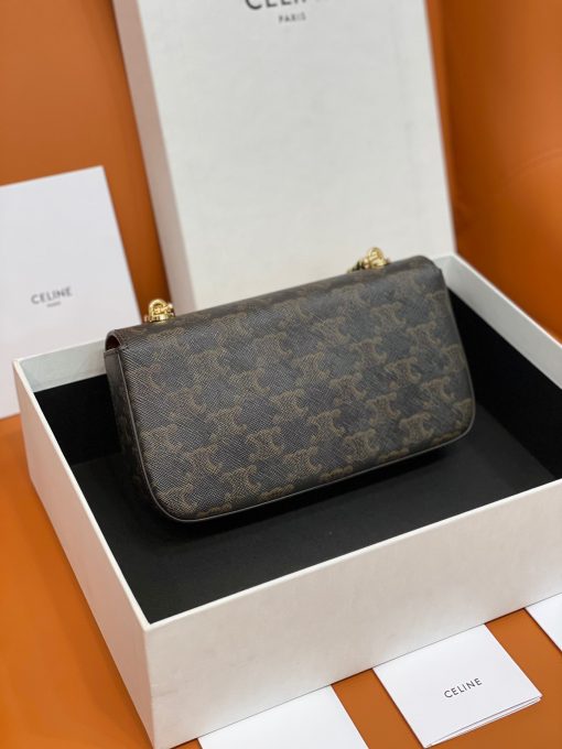 CELINE Chain Shoulder Bag Triomphe In Shiny Calfskin. Authentic quality luxury bag crafted in genuine leather comes with authenticity card, dust bag and gift bag. Effortlessly chic: your perfect companion for everyday elegance. Introducing an exquisite and versatile handbag designed for daily use - the Celine Chain Bag. With its clean and elegant silhouette, this bag is enhanced by a front flap adorned with a stunning Triomphe Metallic Closure. Crafted with utmost attention to detail, it is available in two luxurious materials: Canvas or Calfskin Leather. For added convenience, this bag comes with a drop chain, allowing you to effortlessly carry it as a shoulder or cross body bag. Whether you're attending an evening event or a formal gathering, the Celine Chain Bag will gracefully accompany you. Upon opening the flap, you will discover a spacious main compartment and a handy flat pocket, providing ample storage for your necessities.