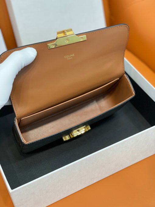 CELINE Chain Shoulder Bag Triomphe In Shiny Calfskin. Authentic quality luxury bag crafted in genuine leather comes with authenticity card, dust bag and gift bag. Effortlessly chic: your perfect companion for everyday elegance. Introducing an exquisite and versatile handbag designed for daily use - the Celine Chain Bag. With its clean and elegant silhouette, this bag is enhanced by a front flap adorned with a stunning Triomphe Metallic Closure. Crafted with utmost attention to detail, it is available in two luxurious materials: Canvas or Calfskin Leather. For added convenience, this bag comes with a drop chain, allowing you to effortlessly carry it as a shoulder or cross body bag. Whether you're attending an evening event or a formal gathering, the Celine Chain Bag will gracefully accompany you. Upon opening the flap, you will discover a spacious main compartment and a handy flat pocket, providing ample storage for your necessities.