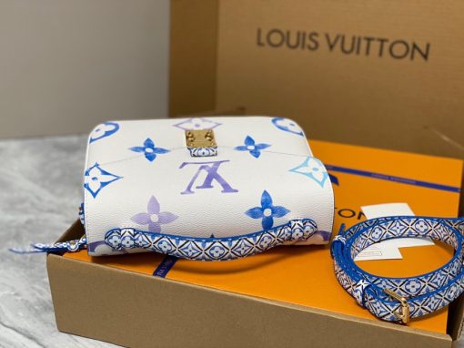 LOUIS VUITTON Pochette Métis MM. Authentic quality luxury bag crafted in genuine leather comes with authenticity card, dust bag and gift bag. Style with a Portuguese Touch. This exquisite Pochette Metis handbag is crafted from cream-colored canvas and highlighted by pastel LV's and Monogram Flowers printed with a watercolor-like effect. The top handle and detachable strap present a more prominent Monogram Flower pattern, reminiscent of the Portuguese painted ceramic tilework.
