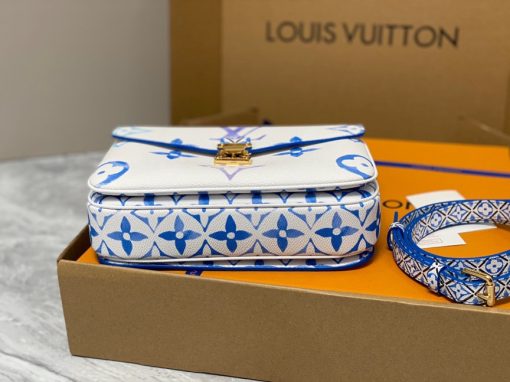 LOUIS VUITTON Pochette Métis MM. Authentic quality luxury bag crafted in genuine leather comes with authenticity card, dust bag and gift bag. Style with a Portuguese Touch. This exquisite Pochette Metis handbag is crafted from cream-colored canvas and highlighted by pastel LV's and Monogram Flowers printed with a watercolor-like effect. The top handle and detachable strap present a more prominent Monogram Flower pattern, reminiscent of the Portuguese painted ceramic tilework.