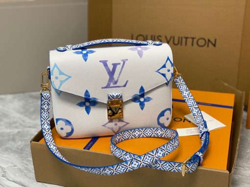 LOUIS VUITTON Pochette Métis MM. Authentic quality luxury bag crafted in genuine leather comes with authenticity card, dust bag and gift bag. Style with a Portuguese Touch. This exquisite Pochette Metis handbag is crafted from cream-colored canvas and highlighted by pastel LV's and Monogram Flowers printed with a watercolor-like effect. The top handle and detachable strap present a more prominent Monogram Flower pattern, reminiscent of the Portuguese painted ceramic tilework.