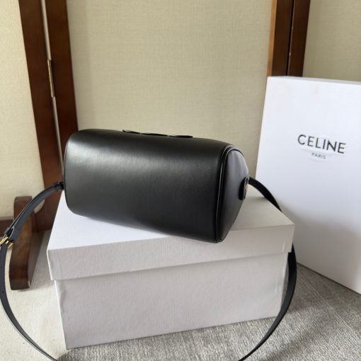 CELINE Small Boston Cuir Triomphe. Authentic quality luxury bag crafted in genuine leather comes with authenticity card, dust bag and gift bag. Style meets sophistication with this timeless bag. This is a classic accessory which is perfect for both day and night. It is made out of smooth calfskin leather with a stitched monogram pattern that creates an elegant, modern look. The bag features a removable and adjustable shoulder strap, a top handle for carrying, and a zipped closure. It also has a main spacious compartment, and one inner flat pocket. It has a small and compact size, perfect for days when you don't want to carry too much. The timeless design will never go out of style, and you'll be sure to feel confident and stylish with this bag on your arm.