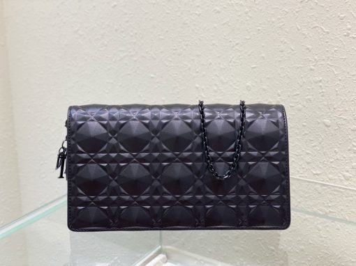 DIOR Lady Dior Pouch. Authentic quality luxury bag crafted in genuine leather comes with authenticity card, dust bag and gift bag. Embrace timeless elegance! The exquisite Lady Dior pouch, handcrafted with the finest calfskin, is easily recognized by its elegant Cannage topstitching embellished with a beautiful Diamond motif, along with a delightful detachable 'D.I.O.R.' charm. This extraordinary accessory offers versatility as it can be worn with or without its chain strap, and it incorporates two detachable components - a practical card holder and a convenient zipped pouch. Each of these elements can be carried individually for added convenience. Adorned with the iconic House motif presented in a striking graphic design, this pouch is sure to make a statement and effortlessly complements other pieces from the same collection.