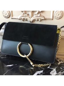 CHLOÉ 'Faye' Small Shoulder Bag. Authentic quality luxury bag crafted in genuine leather comes with authenticity card, dust bag and gift bag. Timeless style meets practicality. Combining functionality with elegance, the new Faye day bag embodies the Maison's nostalgic 70s aura. It boasts a practical magnet closure and spacious compartments, perfect for carrying all of your essentials. The double zips, accompanied by leather pullers, unveil suede gussets that create a delicate textural contrast and lend a feminine charm. Additionally, the bag features the line's distinctive ring loop and a hanging chain that exudes sophisticated hardware and a retro allure. - KRIS + KIKO CHLOÉ 'Faye' Small Shoulder Bag. Original Quality Bag including gift box, care book, dust bag, authenticity card. Functional yet elegant, the new Faye day bag taps into the Maison's 70s spirit while featuring a practical magnet closure and roomy compartments to carry all your belongings. Double zips with leather pullers open to reveal suede gussets for a subtle textural contrast adding a feminine touch. The line’s signature ring loop and hanging chain bring elegant hardware and retro appeal.