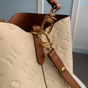 LOUIS VUITTON NéoNoé Monogram Empreinte. Authentic quality luxury bag crafted in genuine leather comes with authenticity card, dust bag and gift bag. A timeless classic reimagined in luxurious Monogram Empreinte. Introducing the NéoNoé in a fresh and exciting style, the brand brings forth a new incarnation of its beloved bag. Crafted from luxurious Monogram Empreinte, this elegant piece showcases supple embossed leather in Noir, Rouge, Crème, and Marine shades. The bag, available in a standard ‘MM’ size, exudes trendiness while maintaining a body-friendly design that is lightweight and effortless to carry. With its detachable and adjustable strap, as well as a removable top handle, it can easily transform into an over-the-shoulder or cross-body version, or even a stylish tote. - KRIS + KIKO LOUIS VUITTON NéoNoé Monogram Empreinte. Authentic quality luxury bag crafted in genuine leather comes with authenticity card, dust bag and gift bag. A timeless classic reimagined in luxurious Monogram Empreinte. Introducing the NéoNoé in a fresh and exciting style, the brand brings forth a new incarnation of its beloved bag. Crafted from luxurious Monogram Empreinte, this elegant piece showcases supple embossed leather in Noir, Rouge, Crème, and Marine shades. The bag, available in a standard ‘MM’ size, exudes trendiness while maintaining a body-friendly design that is lightweight and effortless to carry. With its detachable and adjustable strap, as well as a removable top handle, it can easily transform into an over-the-shoulder or cross-body version, or even a stylish tote.