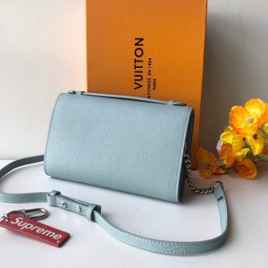 LOUIS VUITTON Lockme Clutch. Authentic quality luxury bag crafted in genuine leather comes with authenticity card, dust bag and gift bag. Unlock the Elegance. Your Day-to-Evening Statement. The Lockme Clutch is a truly eye-catching bag that seamlessly transitions from day to evening. It features the iconic LV turn lock and a luxurious leather top handle, allowing for effortless clutch carry. What sets this bag apart is its clever strap, which can be easily adjusted with press studs to achieve the perfect length for shoulder or cross-body carry. To add a touch of elegance for special evening occasions, a delicate chain is delicately attached to the end of the strap. - KRIS + KIKO LOUIS VUITTON Lockme Clutch. Authentic quality luxury bag crafted in genuine leather comes with authenticity card, dust bag and gift bag. Unlock the Elegance. Your Day-to-Evening Statement. The Lockme Clutch is a truly eye-catching bag that seamlessly transitions from day to evening. It features the iconic LV turn lock and a luxurious leather top handle, allowing for effortless clutch carry. What sets this bag apart is its clever strap, which can be easily adjusted with press studs to achieve the perfect length for shoulder or cross-body carry. To add a touch of elegance for special evening occasions, a delicate chain is delicately attached to the end of the strap.