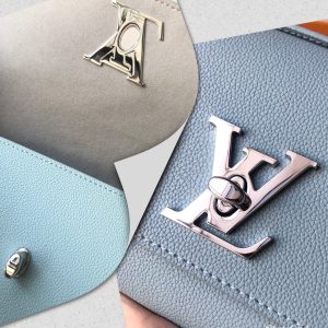 LOUIS VUITTON Lockme Clutch. Authentic quality luxury bag crafted in genuine leather comes with authenticity card, dust bag and gift bag. Unlock the Elegance. Your Day-to-Evening Statement. The Lockme Clutch is a truly eye-catching bag that seamlessly transitions from day to evening. It features the iconic LV turn lock and a luxurious leather top handle, allowing for effortless clutch carry. What sets this bag apart is its clever strap, which can be easily adjusted with press studs to achieve the perfect length for shoulder or cross-body carry. To add a touch of elegance for special evening occasions, a delicate chain is delicately attached to the end of the strap. - KRIS + KIKO LOUIS VUITTON Lockme Clutch. Original Quality Bag including gift box, literature, dust bag, authenticity card. With its iconic LV turn lock and leather top handle for clutch carry, the Lockme Clutch is a striking day-to-evening bag. It boasts a clever strap with press studs to easily adjust the length for shoulder or cross-body carry. The small chain at the end of the strap brings a precious touch for evening occasions.