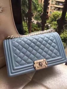 CHANEL 'Boy' Diamond Quilted Leather Flap Bag. Authentic quality luxury bag crafted in genuine leather comes with authenticity card, dust bag and gift bag. Embrace timeless elegance. The Chanel Boy Flap Bag Quilted, a creation by the visionary Karl Lagerfeld, pays tribute to Gabrielle Chanel's beloved Boy Capel. This exquisite bag, reminiscent of every woman's fantasy, is meticulously crafted from premium calfskin leather. It showcases Chanel's iconic diamond quilting, adorned with a bold chain link strap enhanced by a leather shoulder pad, and complemented by delicate metal-tone hardware accents. The bag's CC Boy logo closure gracefully reveals a fabric-lined interior, complete with a convenient slip pocket to house everyday essentials. Truly a cherished and opulent accessory coveted by many. - KRIS + KIKO CHANEL 'Boy' Diamond Quilted Leather Flap Bag. Authentic quality luxury bag crafted in genuine leather comes with authenticity card, dust bag and gift bag. Embrace timeless elegance. The Chanel Boy Flap Bag Quilted, a creation by the visionary Karl Lagerfeld, pays tribute to Gabrielle Chanel's beloved Boy Capel. This exquisite bag, reminiscent of every woman's fantasy, is meticulously crafted from premium calfskin leather. It showcases Chanel's iconic diamond quilting, adorned with a bold chain link strap enhanced by a leather shoulder pad, and complemented by delicate metal-tone hardware accents. The bag's CC Boy logo closure gracefully reveals a fabric-lined interior, complete with a convenient slip pocket to house everyday essentials. Truly a cherished and opulent accessory coveted by many.