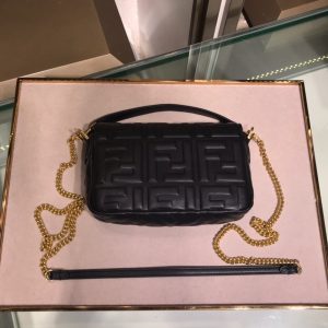 FENDI Baguette Mini. Authentic quality luxury bag crafted in genuine leather comes with authenticity card, dust bag and gift bag. The Resurgence of Elegance. The iconic Baguette bag by Fendi, which was originally created in 1997, is making a triumphant comeback amid the ongoing trend for all things from the Nineties era. This coveted bag quickly surpassed previous bag trends, becoming a phenomenon that had women yearning to possess as many designs as possible. Unlike the timeless classics such as Chanel's 2.55 and Hermes' Kelly and Birkin styles, the Baguette was a fresh and fashion-forward creation, offering both high-end elegance and trendiness. - KRIS + KIKO FENDI Baguette Mini. Original Quality Bag including gift box, literature, dust bag, authenticity card. The original It Bag is back. As the trend for everything the Nineties rolls on, it’s only right that Fendi’s iconic Baguette bag, which was created in 1997, has another turn in the spotlight. At the time, the Baguette quickly transcended any previous bag trends and became a phenomenon with women desperate to own as many designs as possible. There had never been such a fashionable yet high-end bag - yes, there were classics like Chanel’s 2.55 and Hermes’ Kelly and Birkin styles but the Baguette was new and fashion-led.