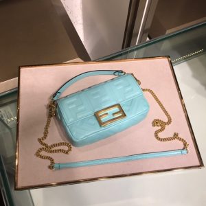 FENDI Baguette Mini. Authentic quality luxury bag crafted in genuine leather comes with authenticity card, dust bag and gift bag. The Resurgence of Elegance. The iconic Baguette bag by Fendi, which was originally created in 1997, is making a triumphant comeback amid the ongoing trend for all things from the Nineties era. This coveted bag quickly surpassed previous bag trends, becoming a phenomenon that had women yearning to possess as many designs as possible. Unlike the timeless classics such as Chanel's 2.55 and Hermes' Kelly and Birkin styles, the Baguette was a fresh and fashion-forward creation, offering both high-end elegance and trendiness. - KRIS + KIKO FENDI Baguette Mini. Original Quality Bag including gift box, literature, dust bag, authenticity card. The original It Bag is back. As the trend for everything the Nineties rolls on, it’s only right that Fendi’s iconic Baguette bag, which was created in 1997, has another turn in the spotlight. At the time, the Baguette quickly transcended any previous bag trends and became a phenomenon with women desperate to own as many designs as possible. There had never been such a fashionable yet high-end bag - yes, there were classics like Chanel’s 2.55 and Hermes’ Kelly and Birkin styles but the Baguette was new and fashion-led.