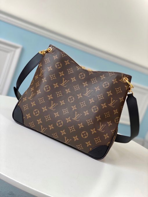 LOUIS VUITTON Odéon Shoulder Bag. Authentic quality luxury bag crafted in genuine leather comes with authenticity card, dust bag and gift bag. Style Meets Functionality in Retro Elegance. LOUIS VUITTON brings forth the all-new Odéon for Fall-Winter 2020, an elegant and practical shoulder bag. The addition of reinforced leather corners and the iconic Monogram canvas infuse this functional accessory with a delightful vintage appeal. With an adjustable leather strap, the Odéon allows for both shoulder and crossbody carry, granting versatility to its user. Furthermore, the inclusion of two zipper pulls ensures effortless opening and closing, providing swift access to the items stored within.